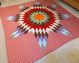 T70 - $150. Multi-Colored Lone Star Quilt. Measures 89" square. Excellent Condition.