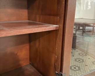 T32 - $175. Mahogany Finish Buffet. Measures 66.5" x 16.5" x 35" tall. Has 4 drawers that all slide easily and 2 glass doors with shelves inside.