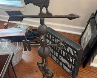 Cast metal rooster weathervane with directional arrow on stand