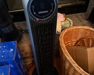 Tower fan with digital touch controls and remote sensor