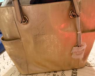Michael Kors gold embossed patent leather tote handbag