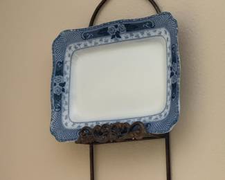 Blue and white floral rectangular platter on wrought iron stand