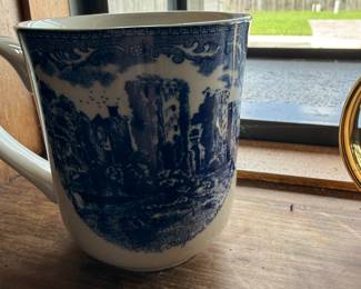 Blue and white transferware mug with Raglan Castle scene