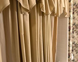 Tan ruffled fabric shower curtain with valance