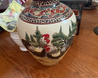 Ceramic vase with hand-painted rooster and pine tree design