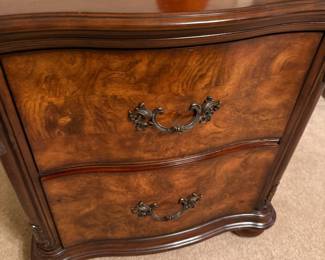 Burl wood two-drawer nightstand with ornate brass pulls