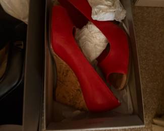 Red leather peep-toe cork wedge heels in box