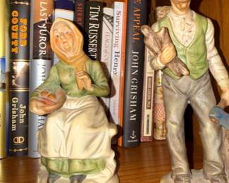 Porcelain elderly man and woman figurines, pair