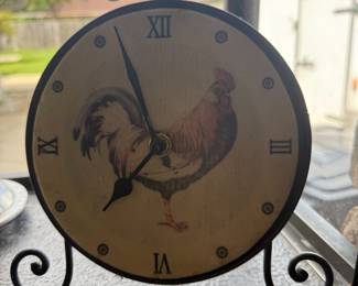 Rooster face table clock with scrolled black metal stand