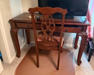 Wooden writing desk with carved cabriole legs and matching chair