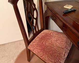 Chippendale style side chair with pierced back and upholstered seat