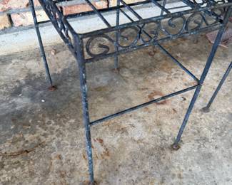 Wrought iron scrolled patio side table with mesh top