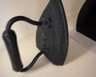 Antique cast iron sad iron with handle