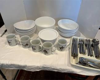 White Bowls And Stainless Steel Hampton Silverware.