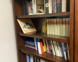 Four Shelves Of Books Old And New