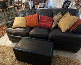 Super Brown LeatherLooking Sofa, Ottoman, and Lamp Table.