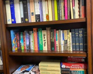 Four Shelves Of Books And Highlight Of Recent History
