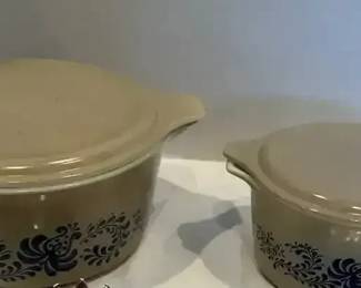 Two Pyrex Homestead Crocks With Lids