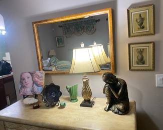 Mirror, Prints, and Delightful Dresser Top Decor.