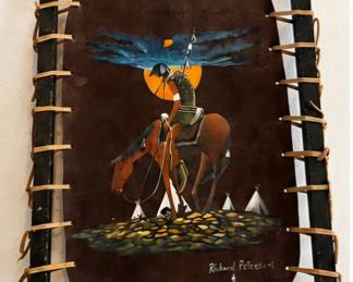 SW-style painted leather wall art depicting a Native American rider on horseback.