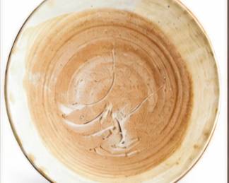 Ceramic dish with artistic, interior brush strokes.