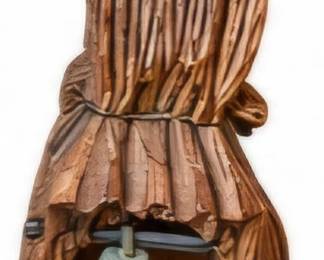 Rustic carved wooden bell décor