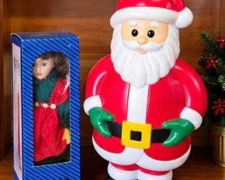 Santa figure with holiday tree & boxed Christmas doll