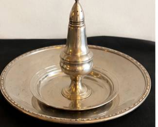 Silver-tone serving tray with matching pedestal shaker.