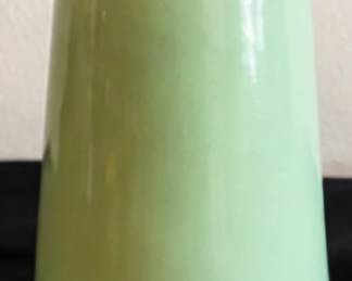 Vintage pale green ceramic vase with a simple, classic shape