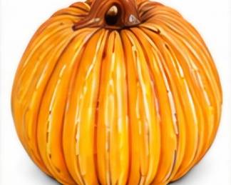 Decorative orange pumpkin figurine with ribbed detailing.