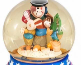 SW-themed snow globe with colorful cactus-design base.