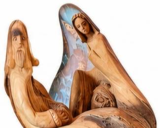 Carved wood figurative sculpture