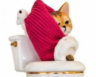 Whimsical Santa cat-on-toilet figurine