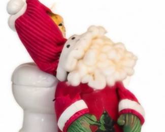 Dangling-leg Santa figurine
