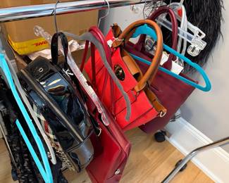 LARGE NUMBER OF PURSES - MOST ARE NEW WITH TAGS ON
