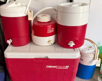 Collectopm of 1980's Coleman water containers