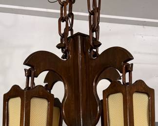 Handcrafted wood chandelier. Almost Tiki...
