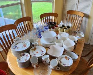 Kitchen table, chairs and dishes