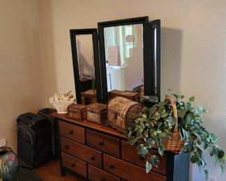 Dresser with mirrors and decorations