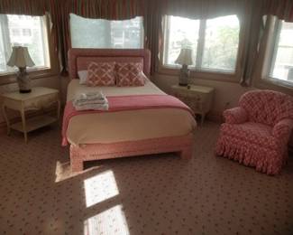 Beautiful queen bedroom suite. End tables; table lamps; upholstered arm chiar