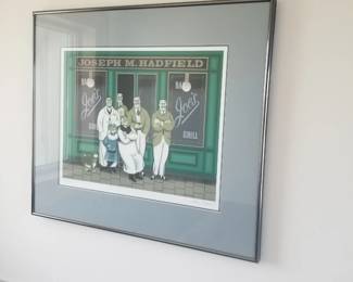 Framed color lithograph print titled "Joe's Bar" by the artist Jan Balet