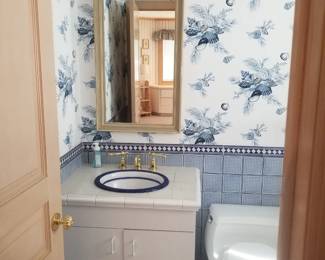 Vanity lights; mirror; bath vanity; Kohler San Raphael commode