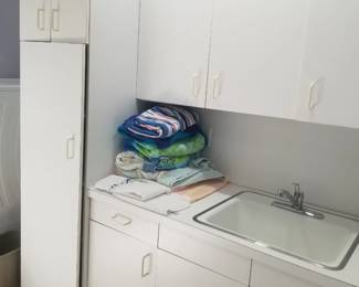 Laundry room cabinetry; laundry sink