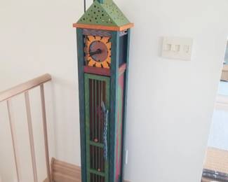 Hand-painted folk art tall case or totem clock, resembling works by artisan Robert Massa 