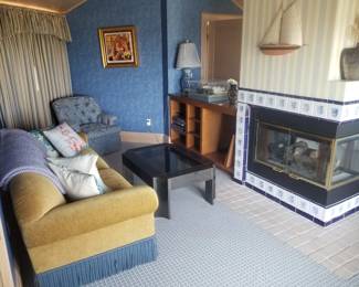 Art Deco-inspired sofa; coffee table; art & decor