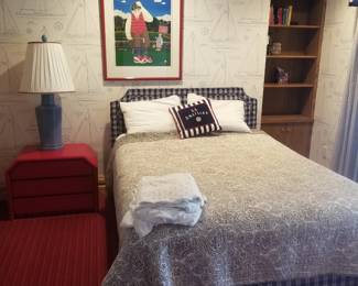Queen bed; nightstand; table lamp