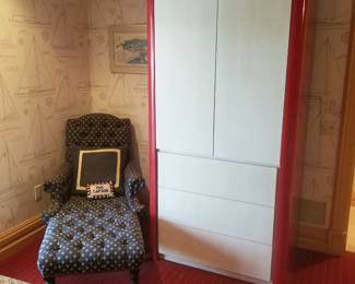 Arm chair with tufted ottoman; lacquer armoire