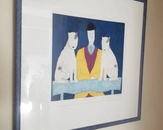Framed art print is "Lady with Two Dogs" (blue version) by contemporary British artist Annora Spence