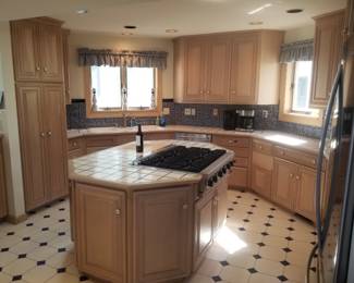 Custom kitchen with island - ample upper & lower cabinetry