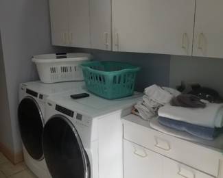 Laundry room cabinets; two sets of Whirlpool washers & GAS  dryers